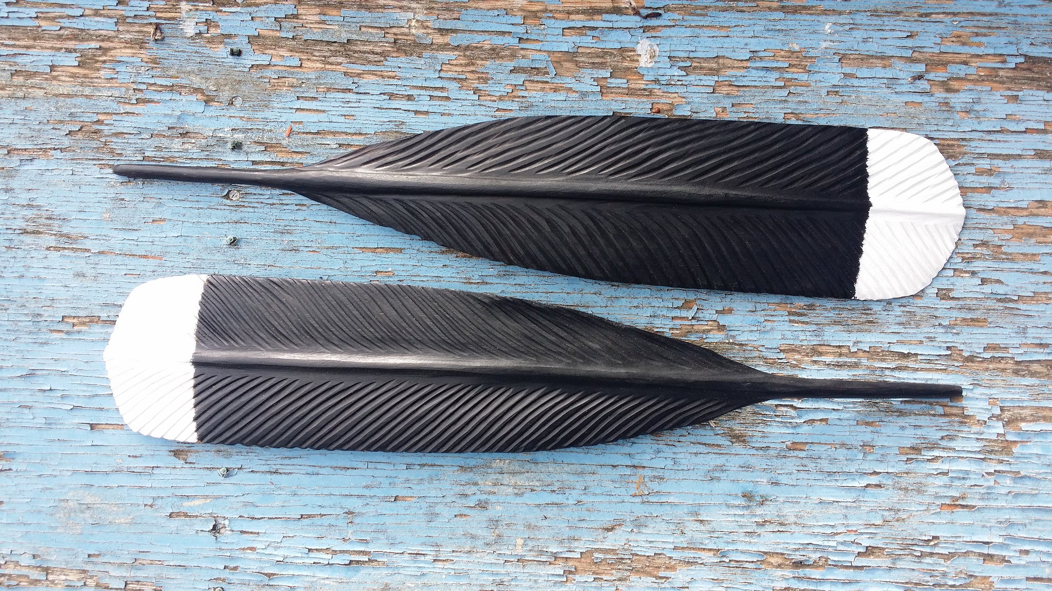 Huia Feather - range $250-$3,800 based on size